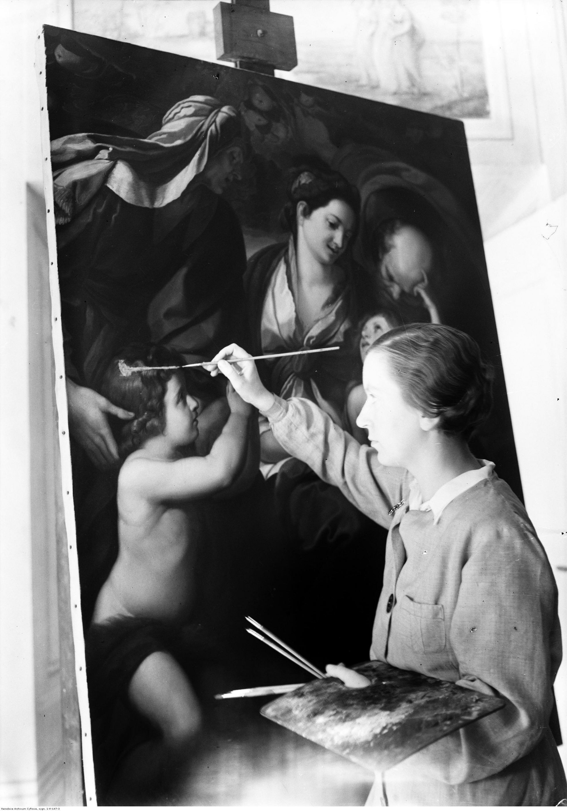 Anna Skraszanka podczas konserwacji kopii obrazu Święta Rodzina Giulia Cesarego Procacciniego, namalowanej przez Floriana Cynka, wrzesień 193